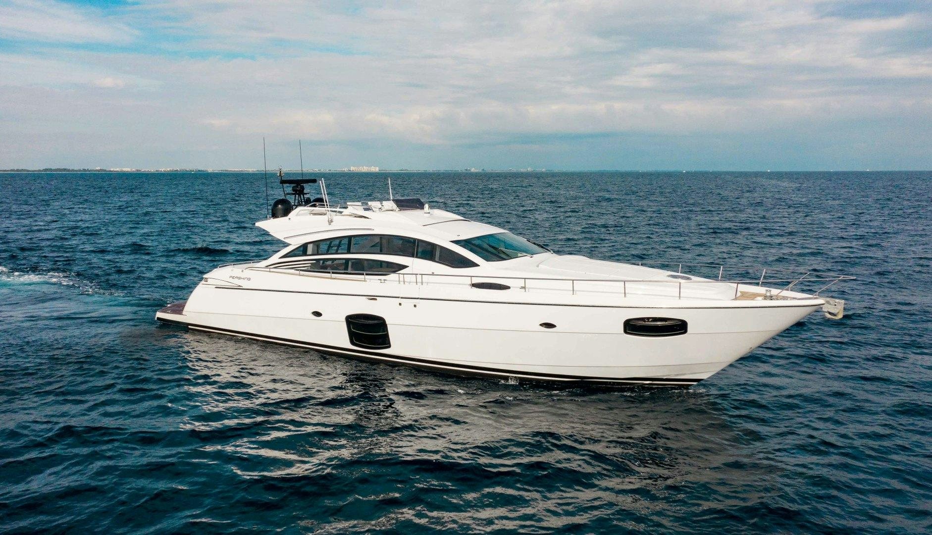 a white yacht in the water aboard JULIE K Yacht for Sale