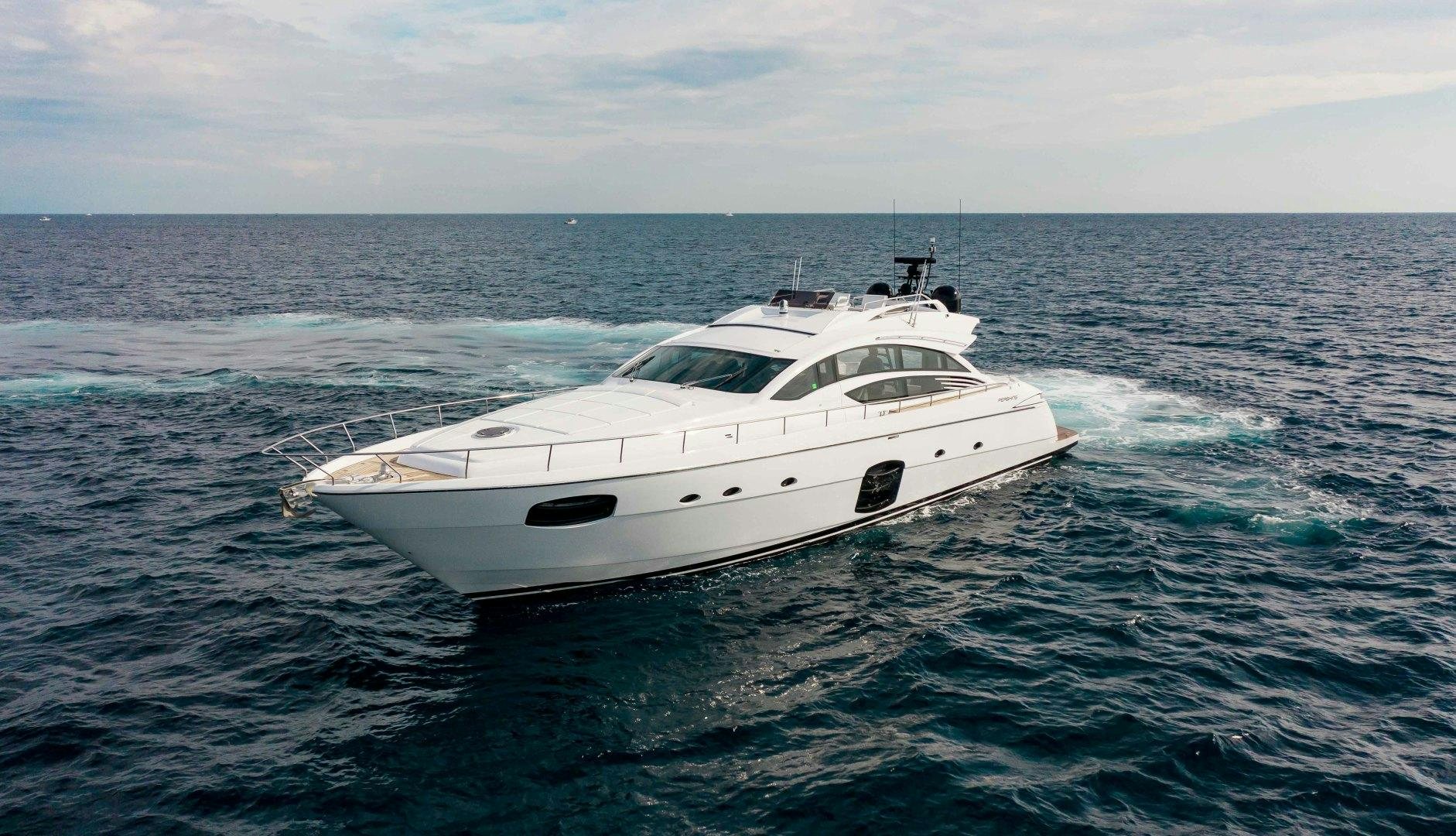 a white yacht in the water aboard JULIE K Yacht for Sale