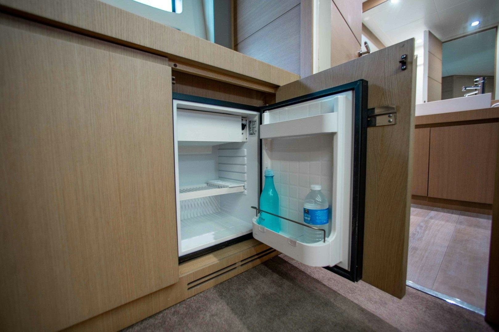 a refrigerator is open aboard JULIE K Yacht for Sale