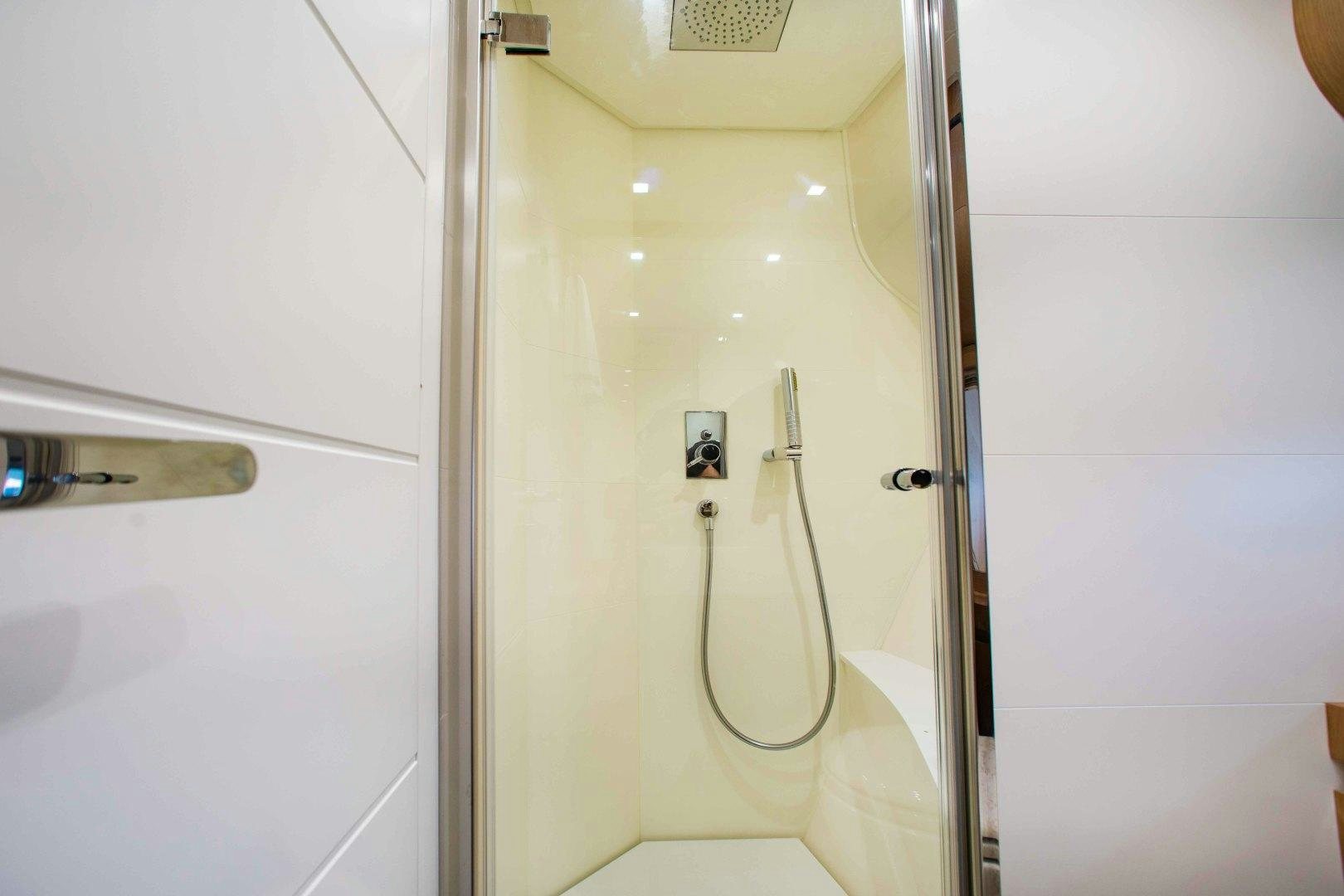 a bathroom with a urinal aboard JULIE K Yacht for Sale