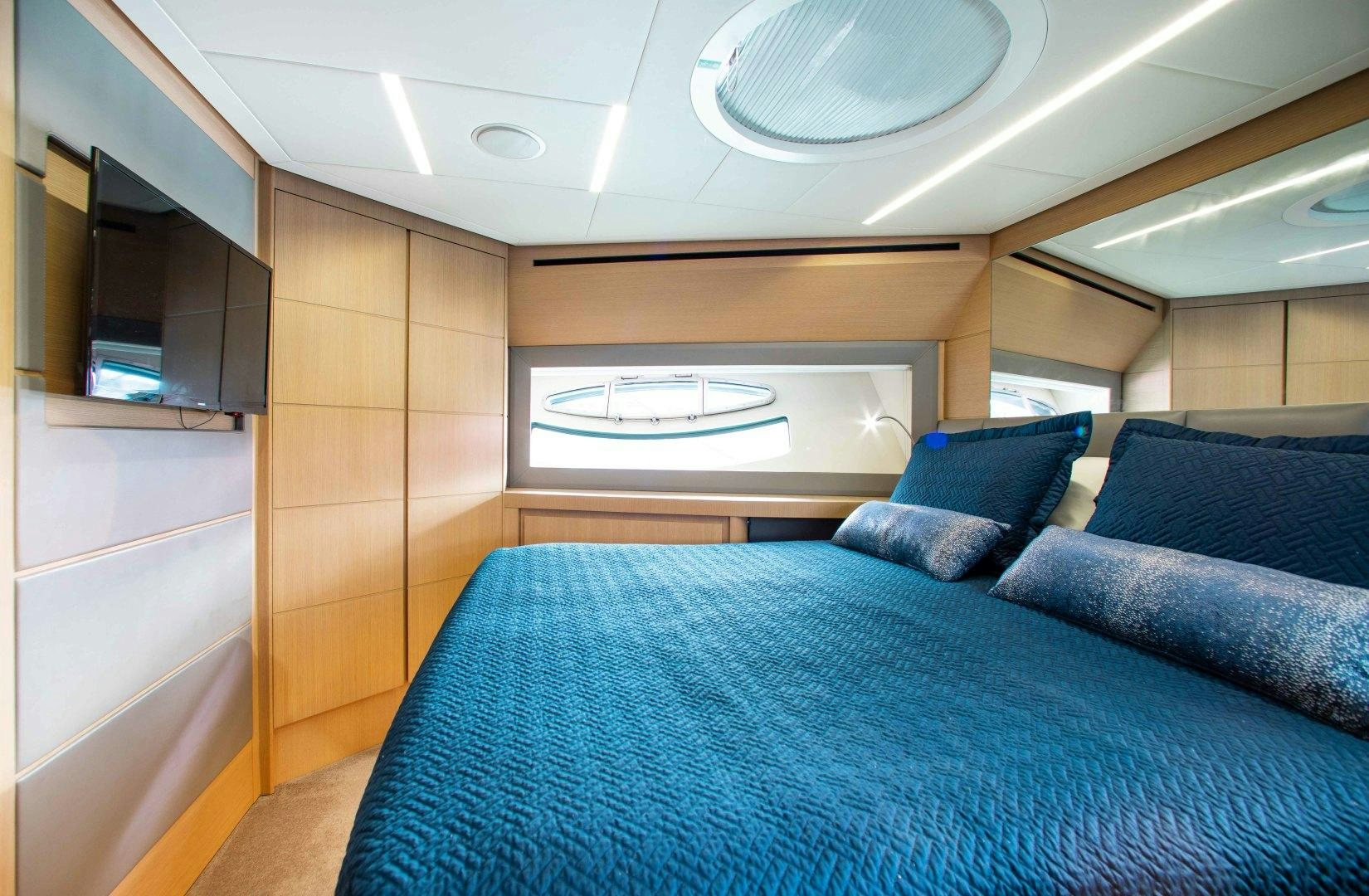 a bed in a room aboard JULIE K Yacht for Sale