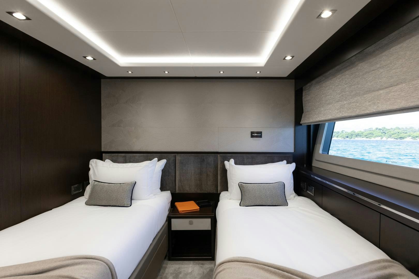a room with two beds aboard SEDATIVE Yacht for Sale