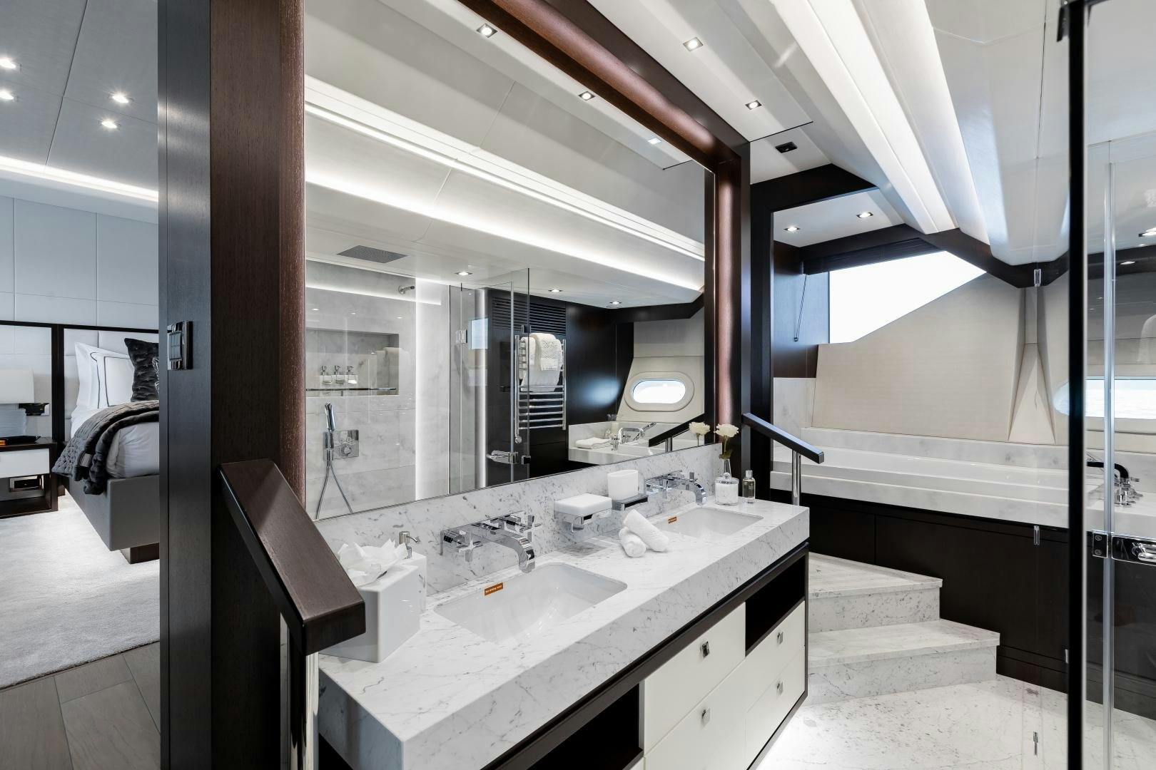 a bathroom with a sink and a mirror aboard SEDATIVE Yacht for Sale