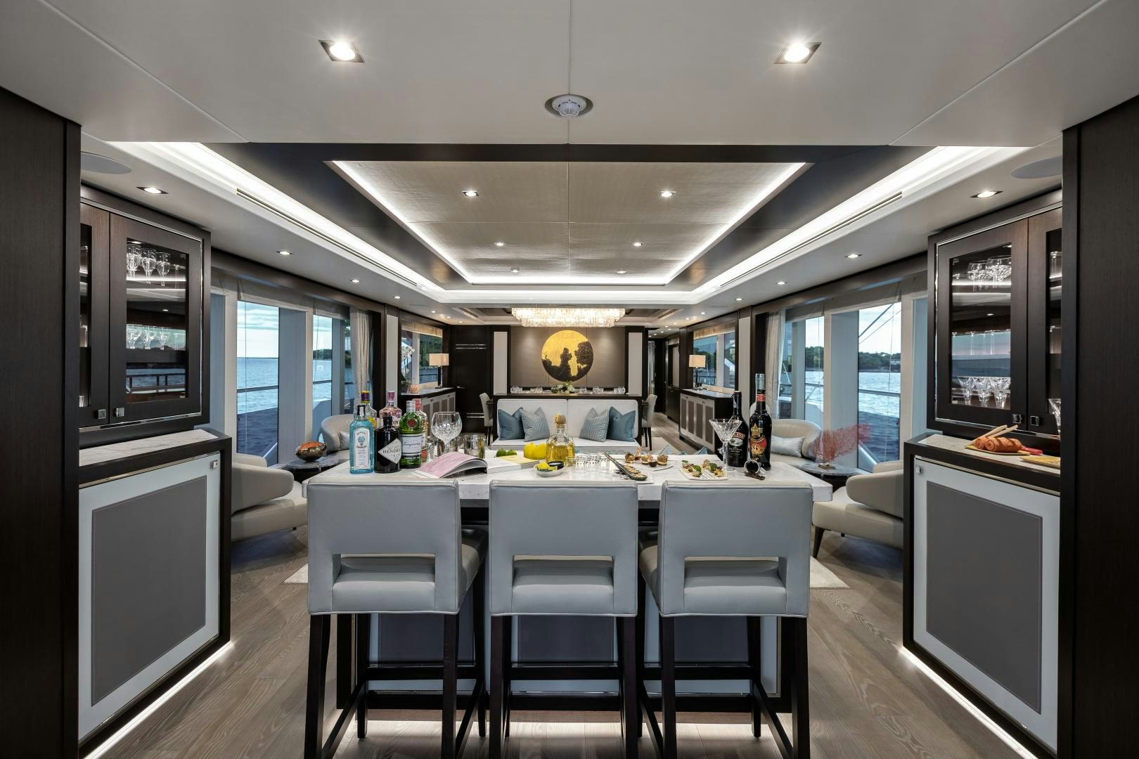a kitchen with a table and chairs aboard SEDATIVE Yacht for Sale