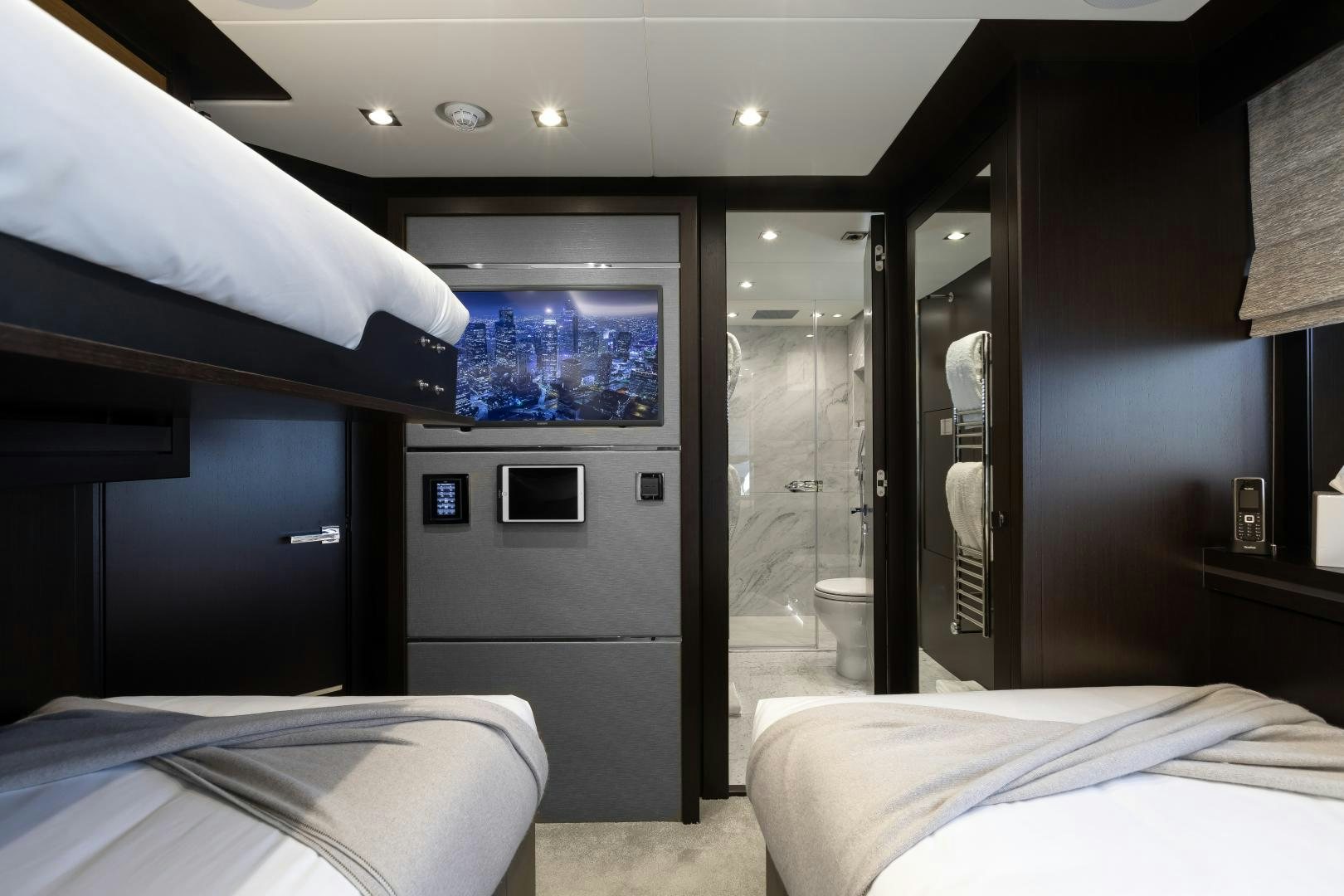 a room with a bed and a tv aboard SEDATIVE Yacht for Sale