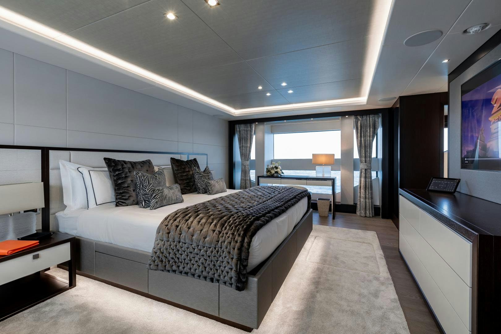 a bedroom with a large bed aboard SEDATIVE Yacht for Sale