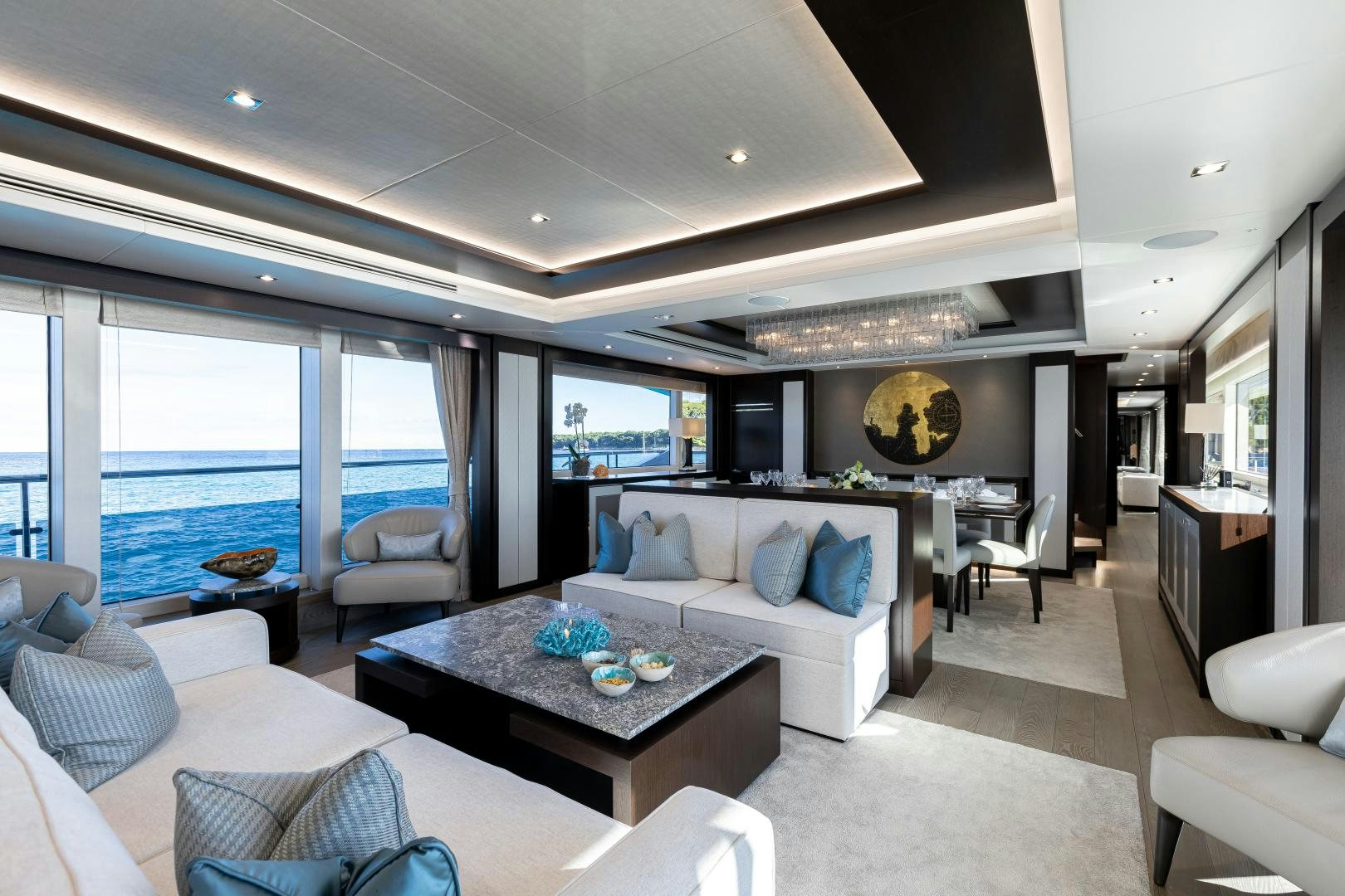 a living room with a large window aboard SEDATIVE Yacht for Sale