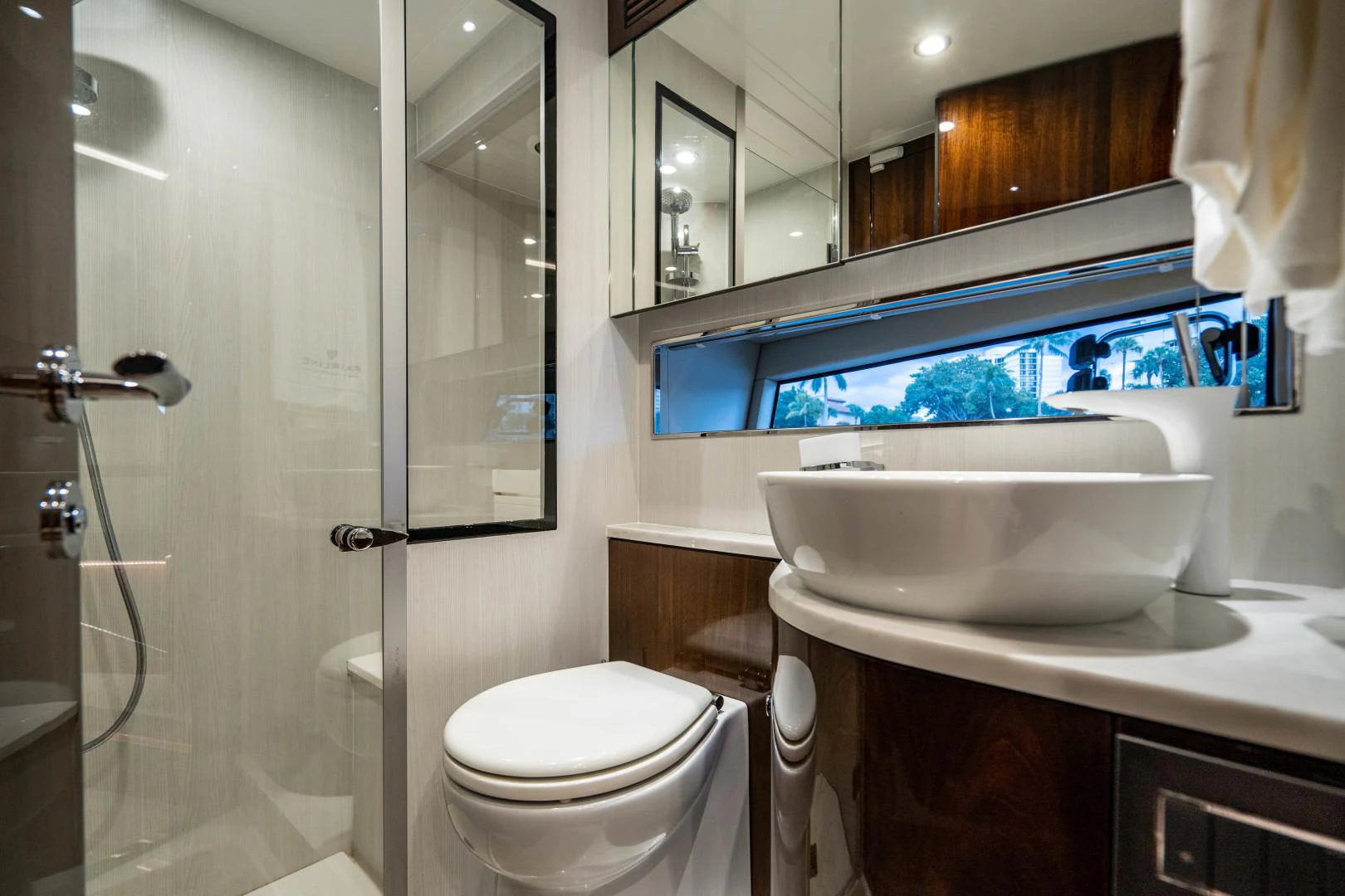 a bathroom with a sink and a toilet aboard BLIND DATE Yacht for Sale