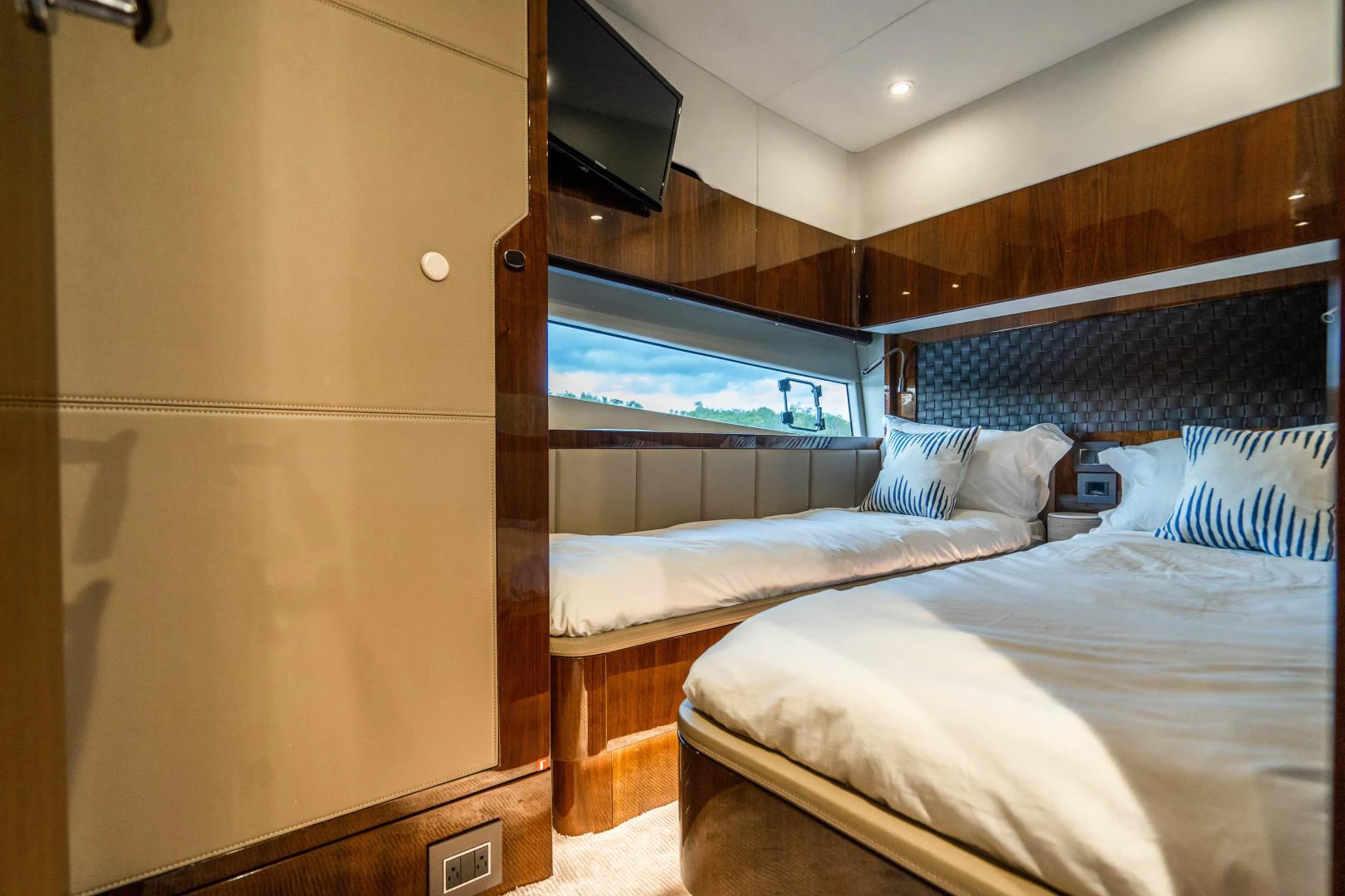 a room with two beds aboard BLIND DATE Yacht for Sale