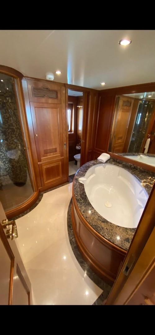 a bathroom with a large tub aboard LA BELLA SARA III Yacht for Sale