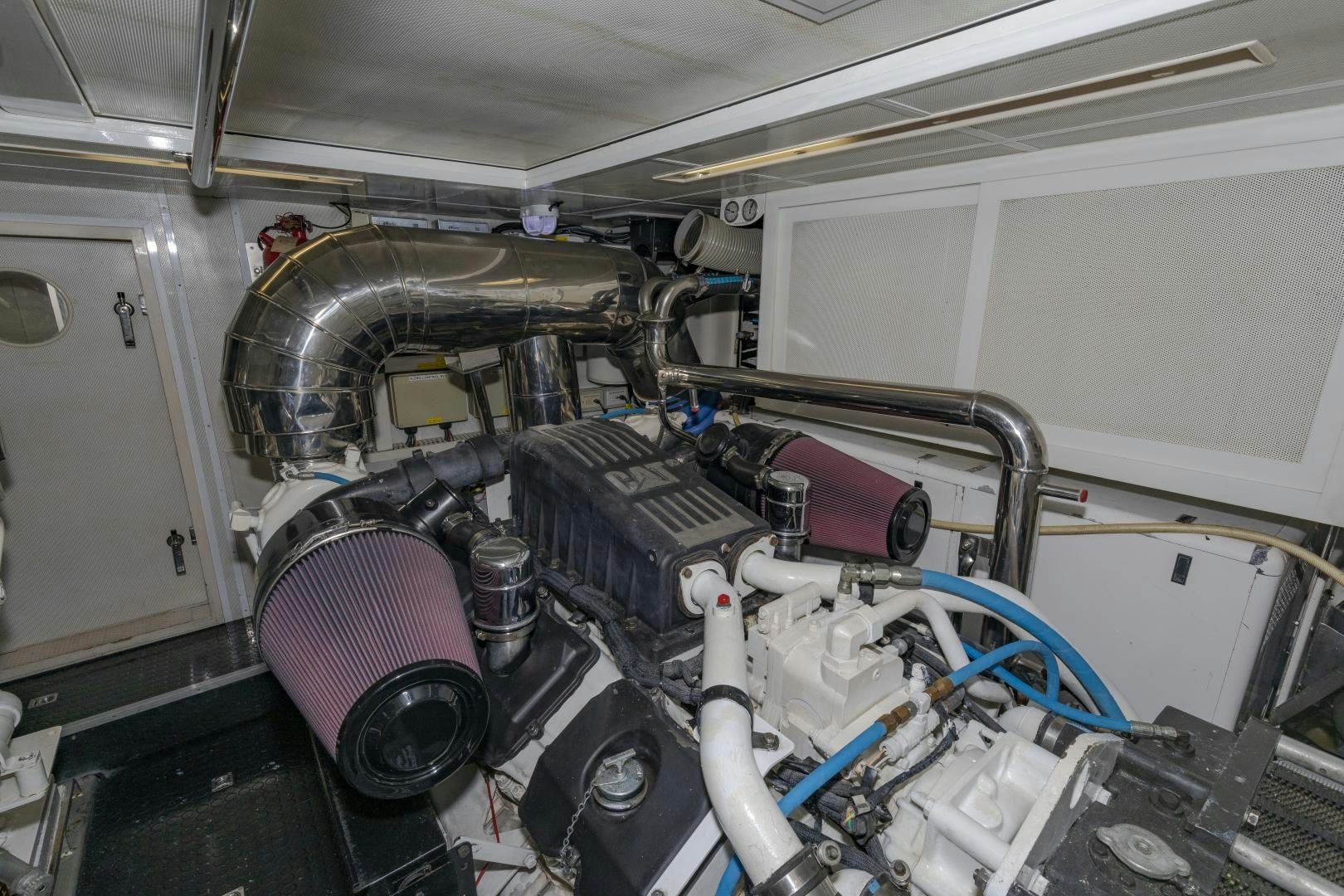 a car with a large engine aboard VIAGGIO Yacht for Sale