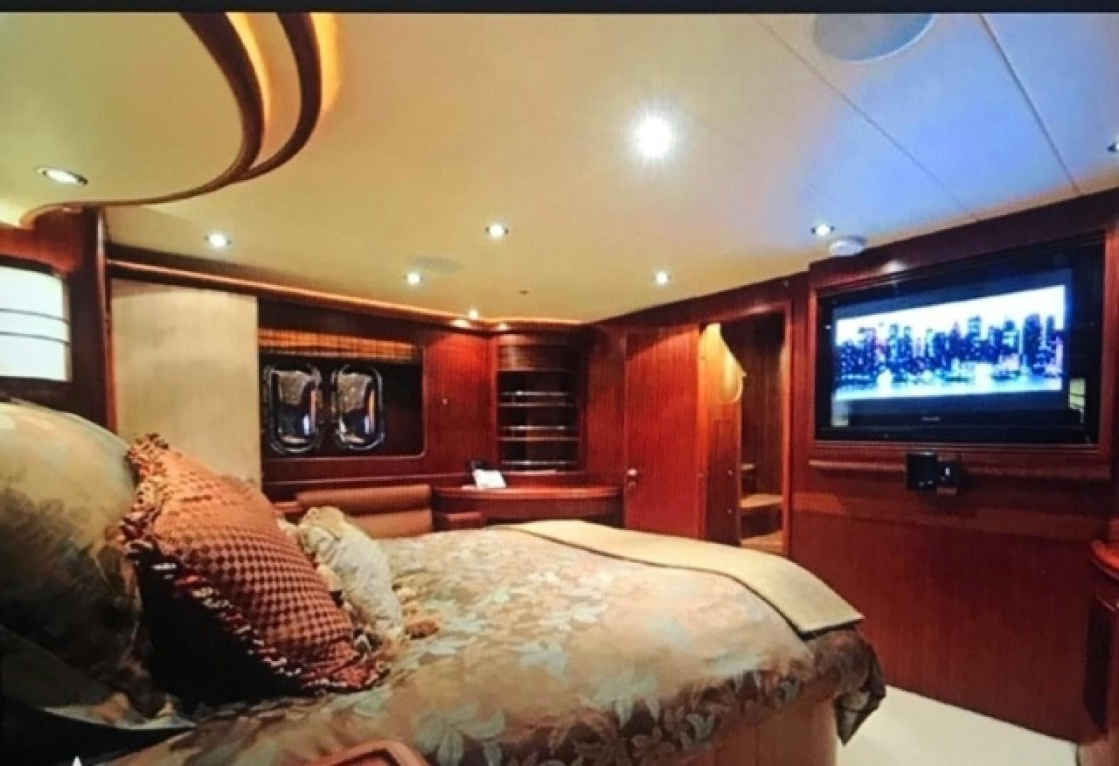 a television is mounted on the wall aboard VIAGGIO Yacht for Sale
