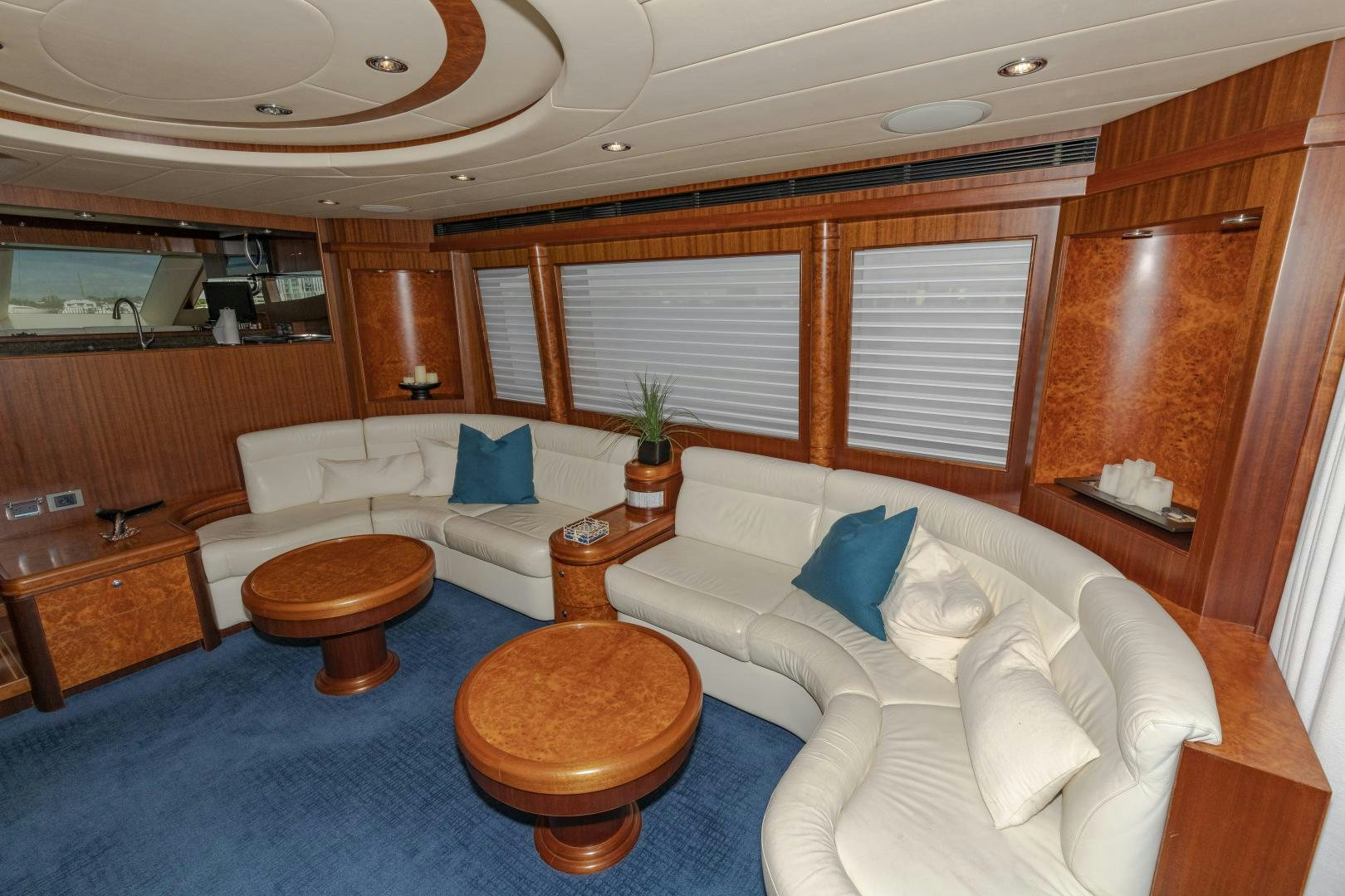 a living room with a couch and a table aboard VIAGGIO Yacht for Sale