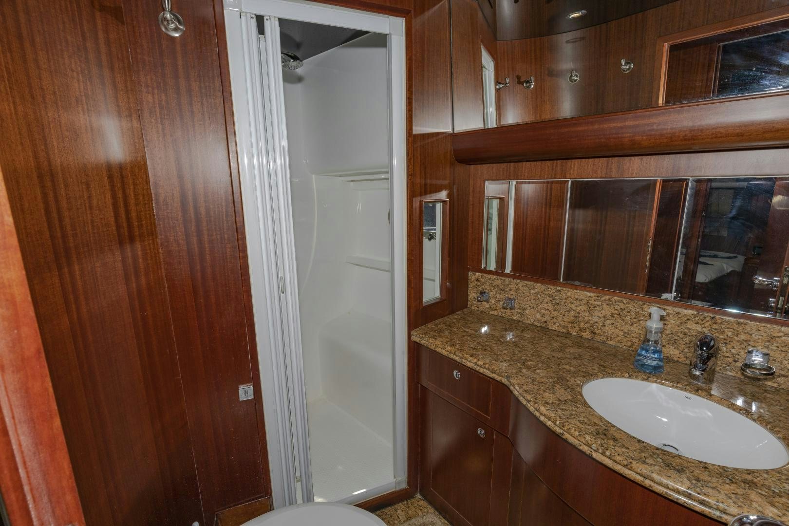 a bathroom with a sink and a mirror aboard VIAGGIO Yacht for Sale