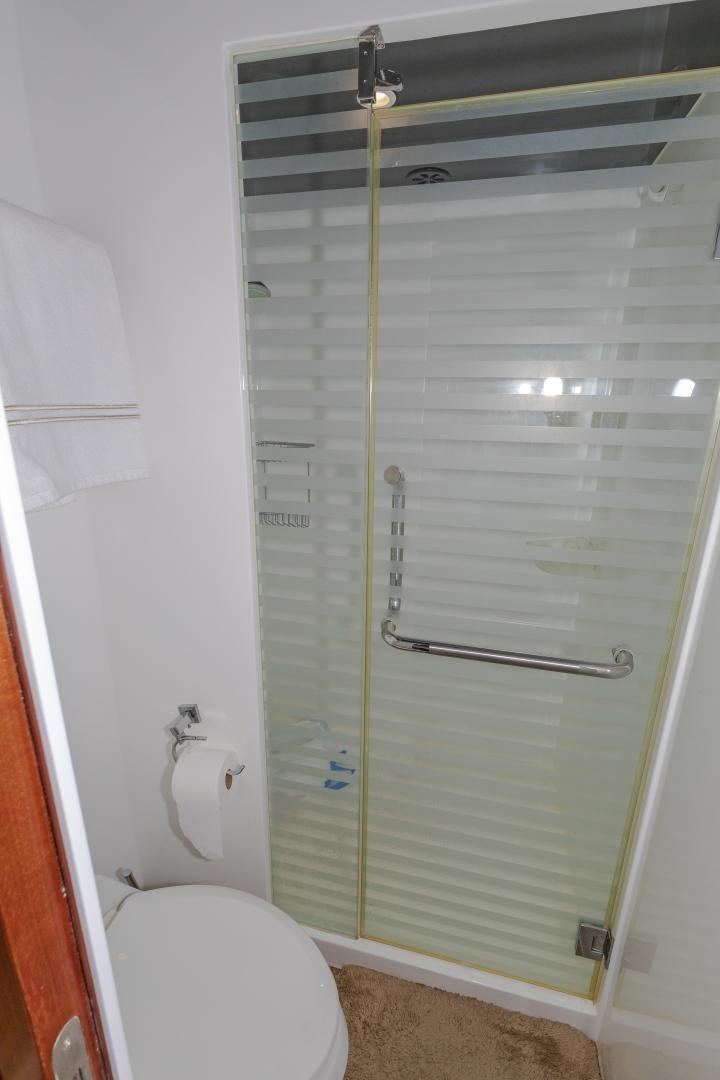 a shower with a glass door aboard VIAGGIO Yacht for Sale