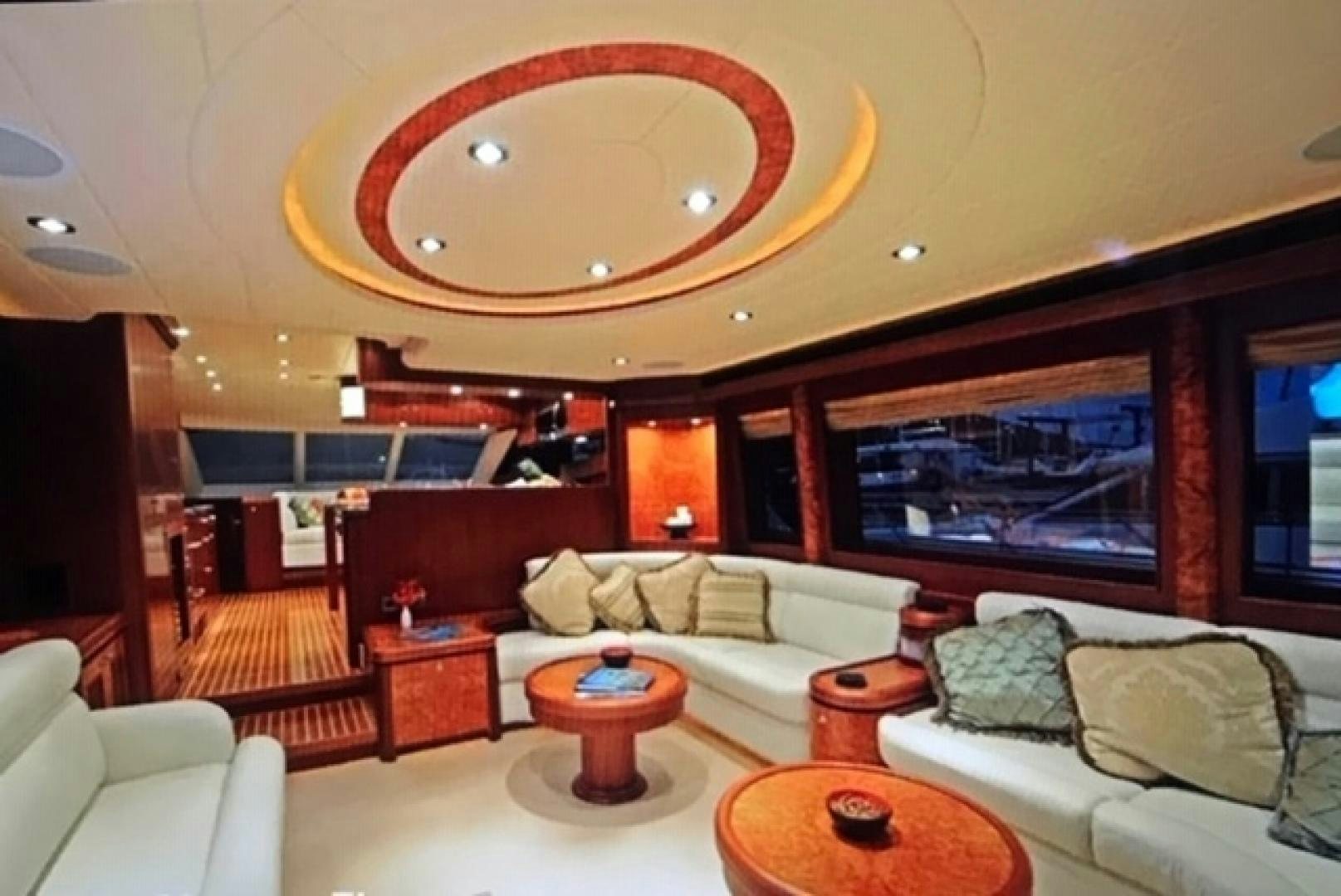 a living room with a large window aboard VIAGGIO Yacht for Sale