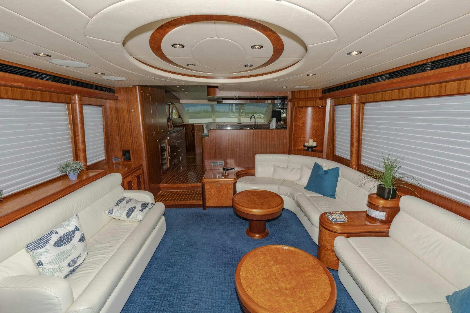 a room with a bed and a couch aboard VIAGGIO Yacht for Sale