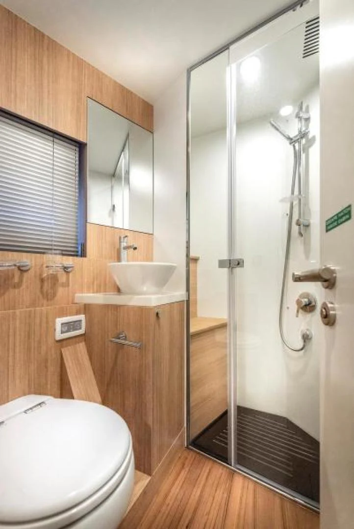 a bathroom with a shower and sink aboard ZARANIA Yacht for Sale