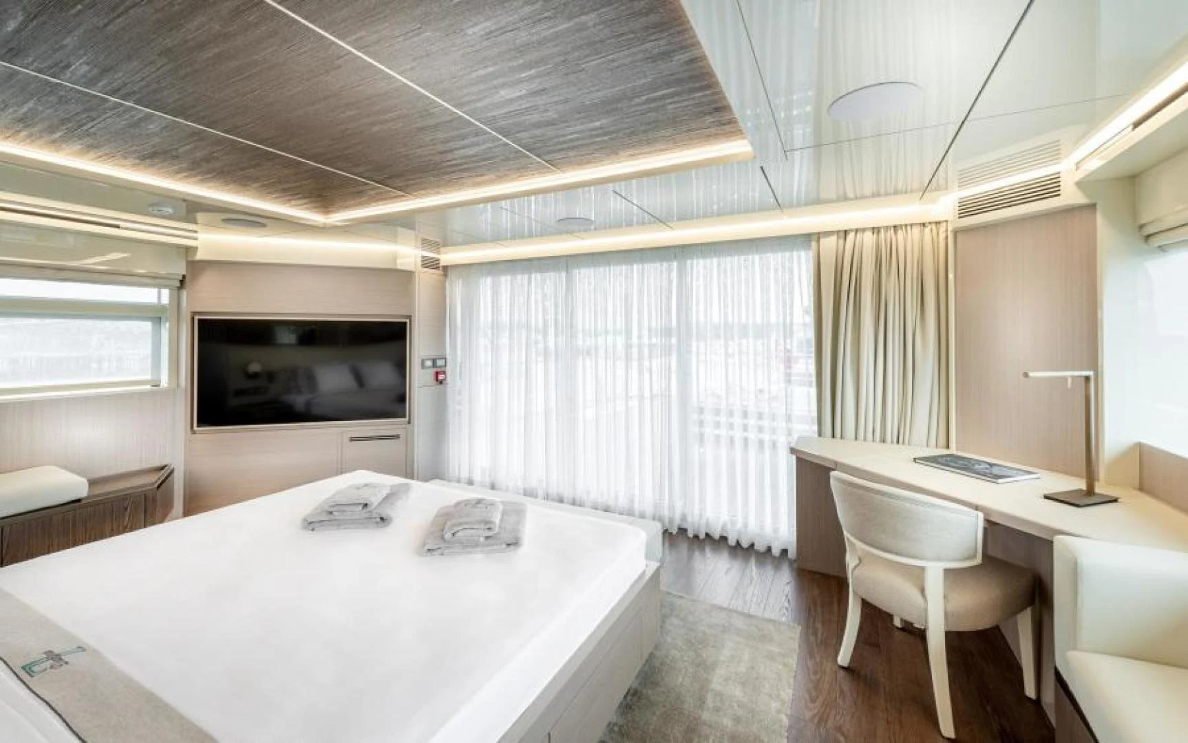 a room with a table and chairs aboard ZARANIA Yacht for Sale