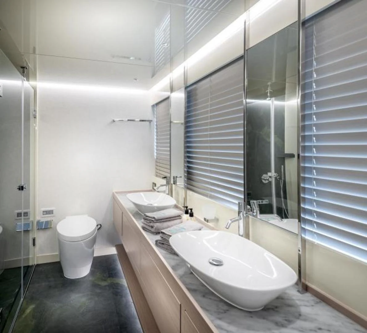 a bathroom with a sink and a mirror aboard ZARANIA Yacht for Sale