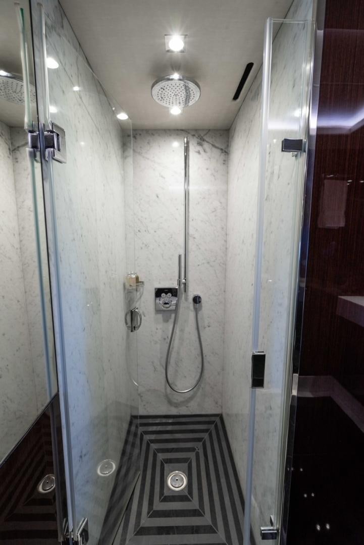 a bathroom with a shower aboard ENTERPRISE Yacht for Sale