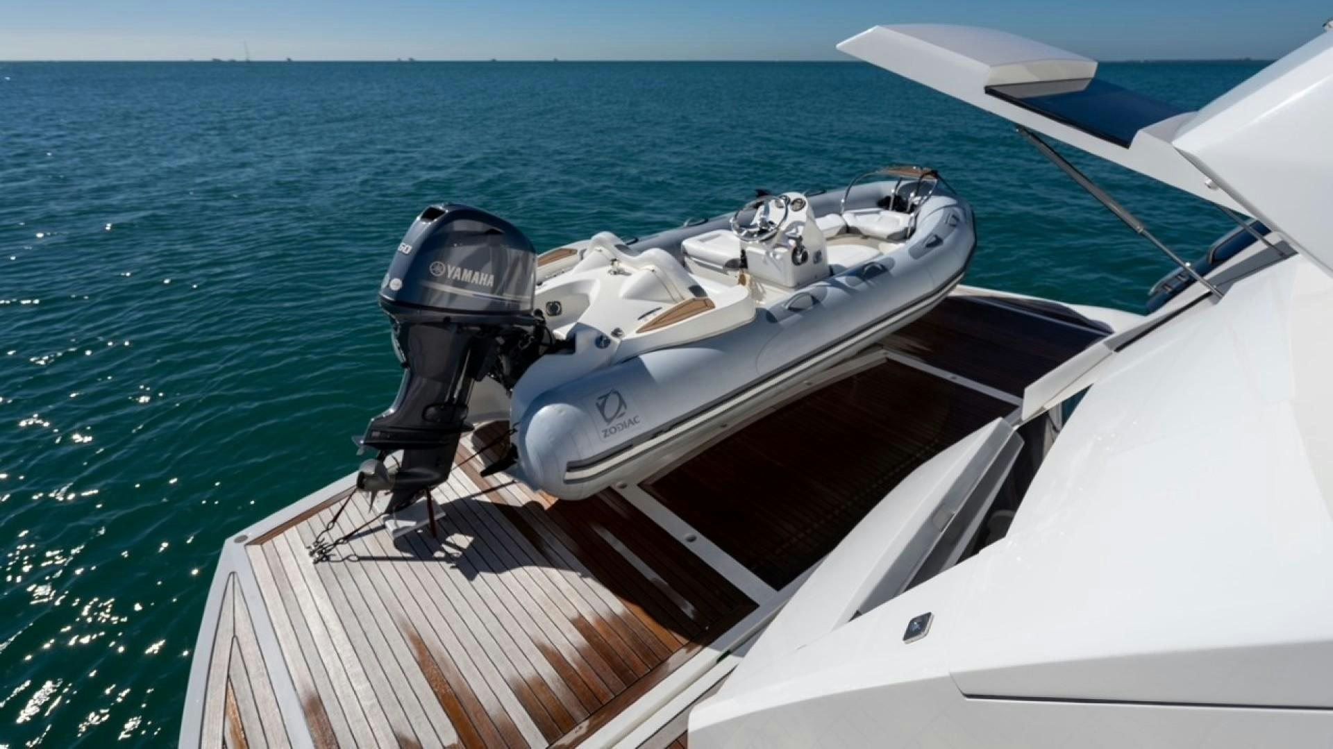 a boat with a motor attached to it aboard ENTERPRISE Yacht for Sale
