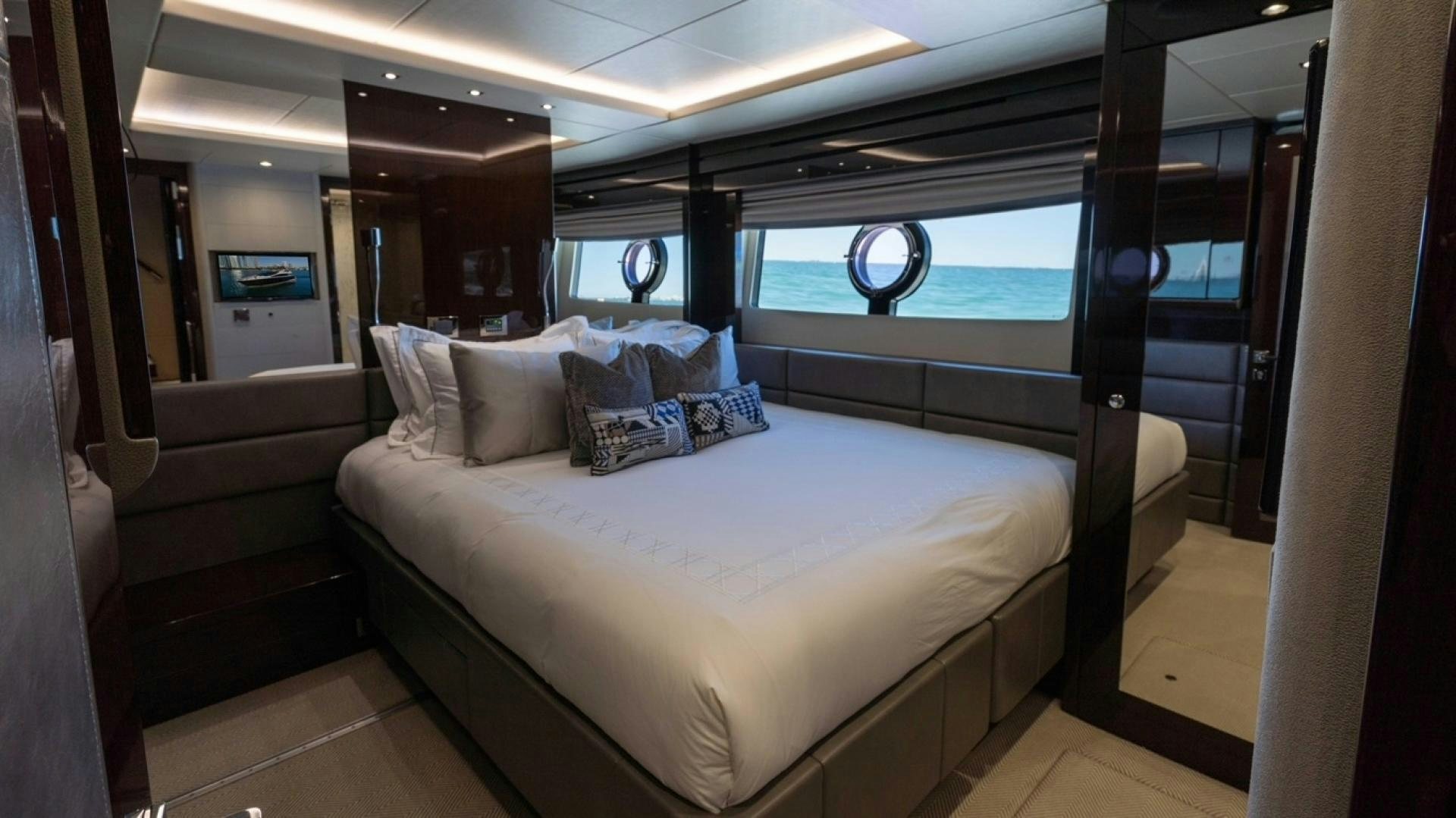 a bed in a room aboard ENTERPRISE Yacht for Sale