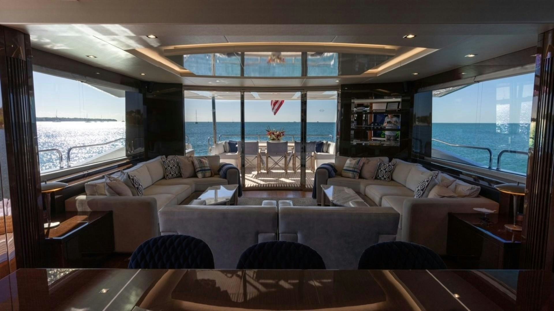 a living room with a large window aboard ENTERPRISE Yacht for Sale