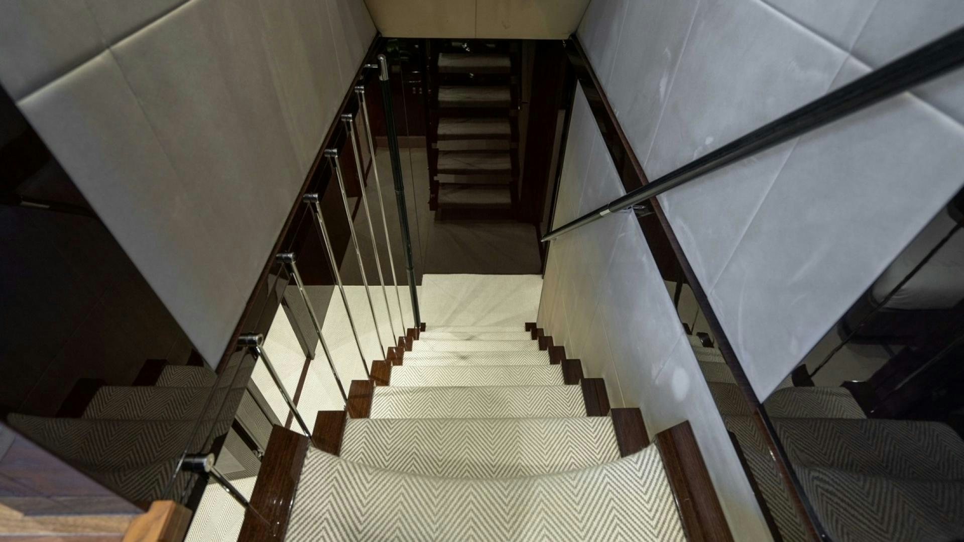 a staircase with a set of stairs aboard ENTERPRISE Yacht for Sale