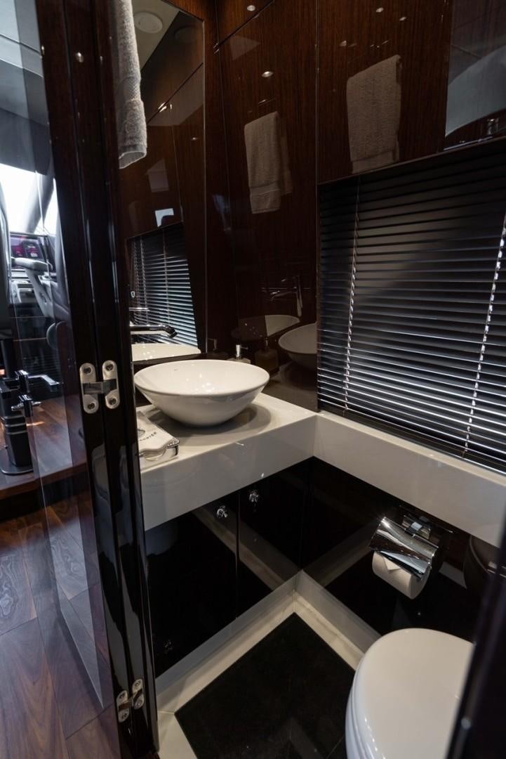 a bathroom with a sink and a mirror aboard ENTERPRISE Yacht for Sale