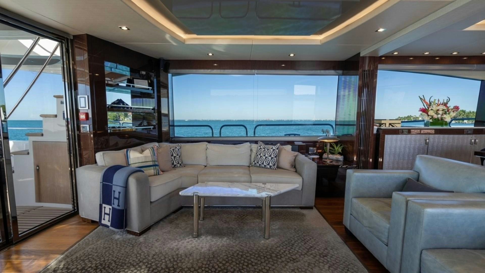 a living room with a large window aboard ENTERPRISE Yacht for Sale