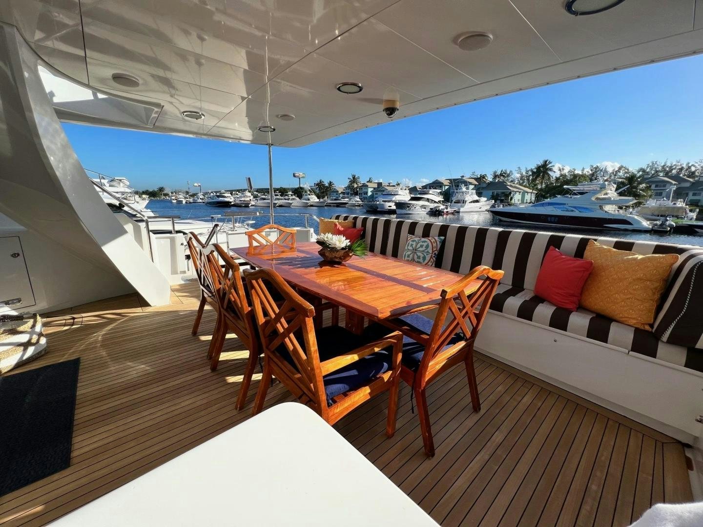 a table and chairs on a boat aboard THREE KINGS Yacht for Sale