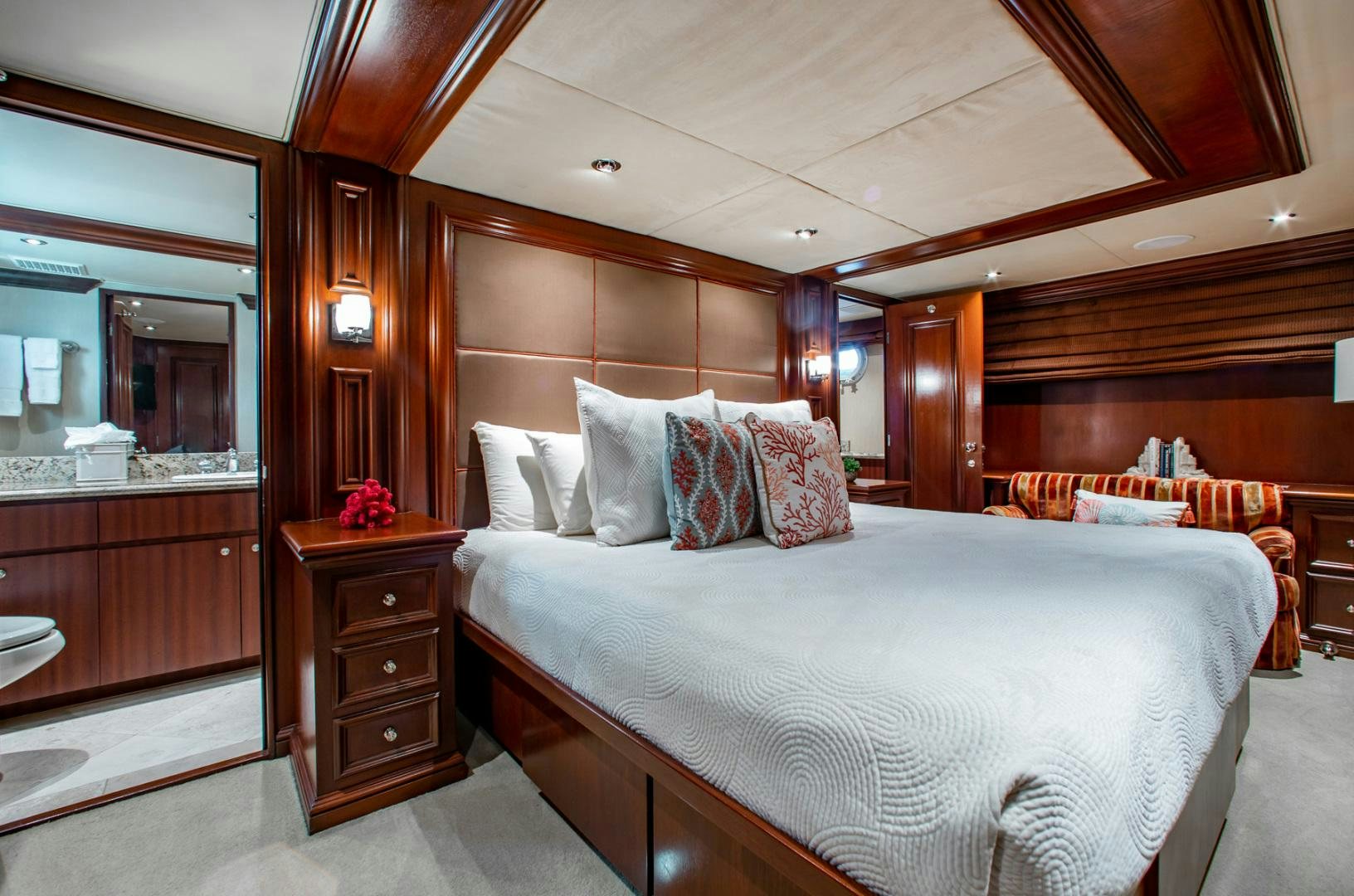 a bed in a room aboard THREE KINGS Yacht for Sale