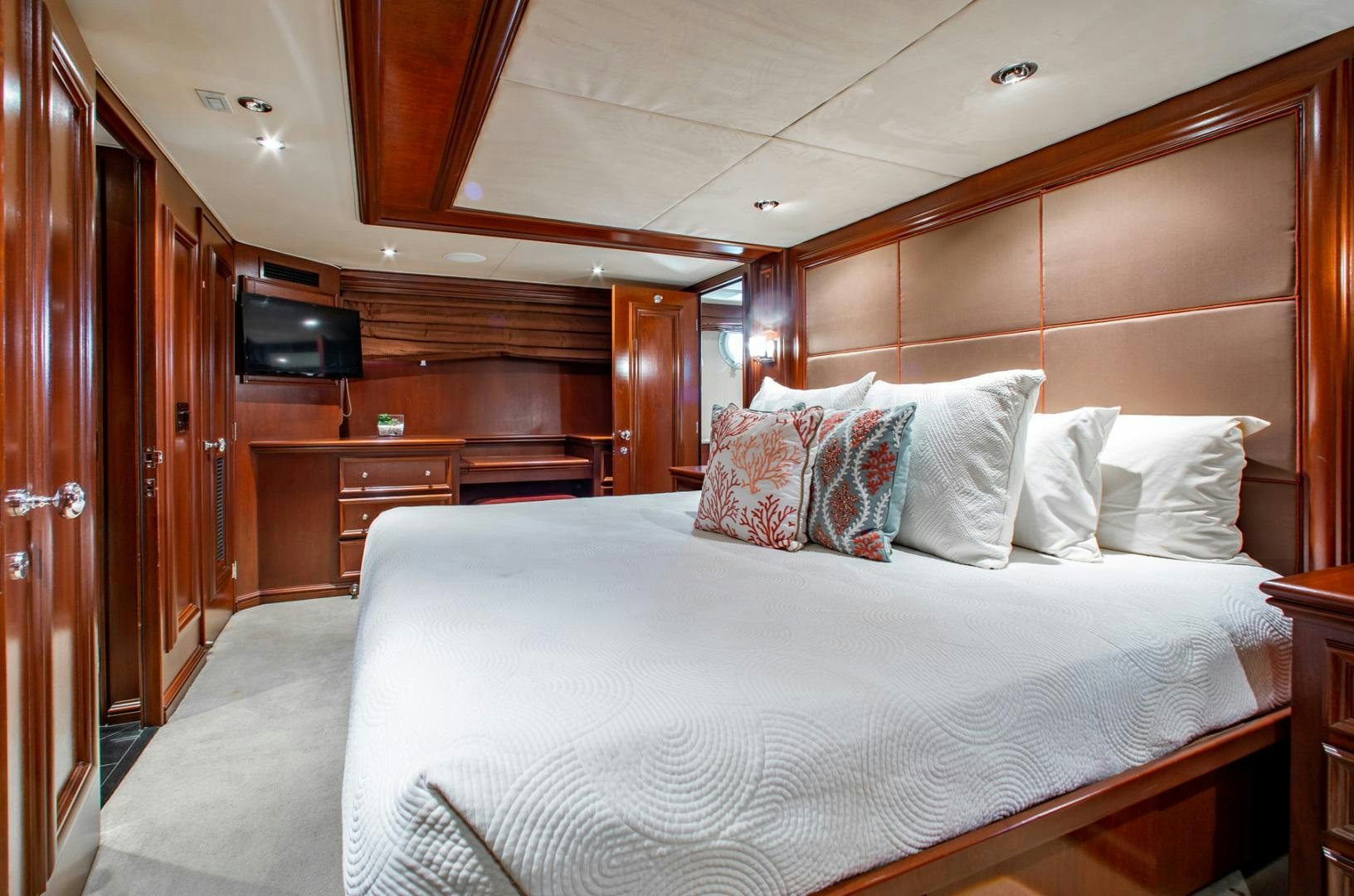a bed in a room aboard THREE KINGS Yacht for Sale