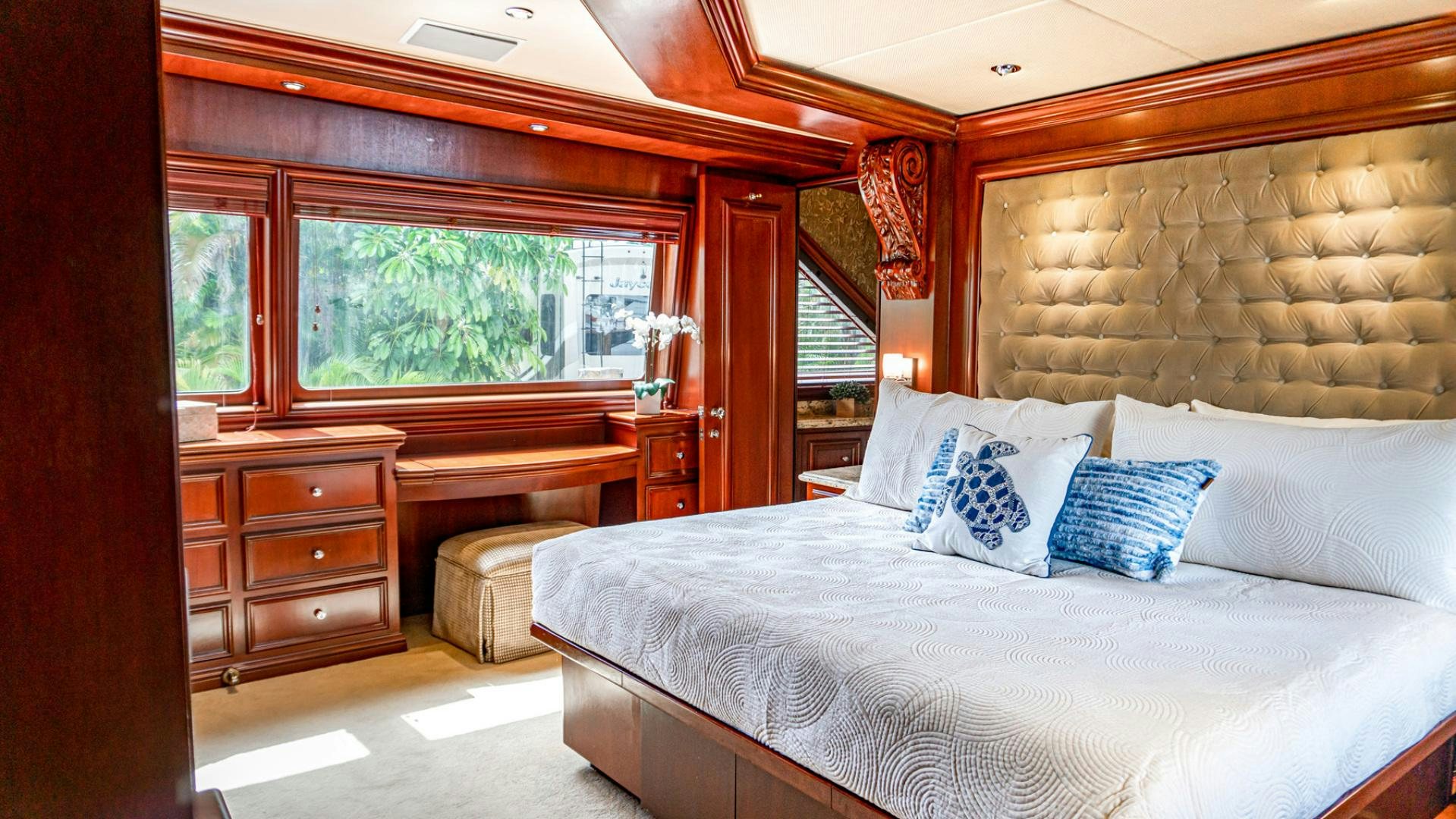a large bed in a room aboard THREE KINGS Yacht for Sale