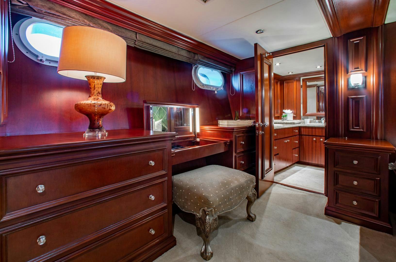 a room with a desk and a lamp aboard THREE KINGS Yacht for Sale