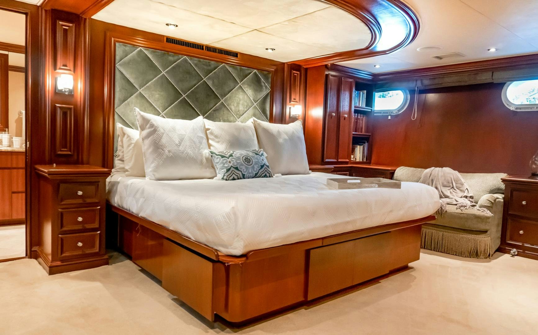 a bed in a room aboard THREE KINGS Yacht for Sale