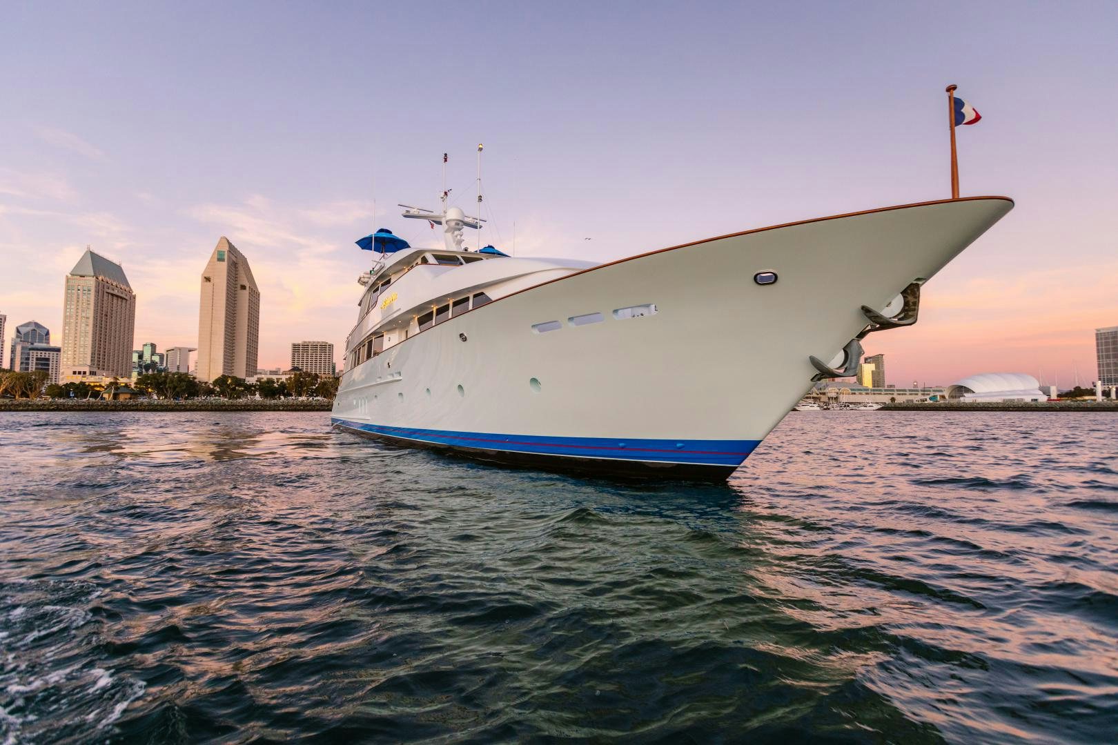 a large white boat in the water aboard APHRODITE Yacht for Sale