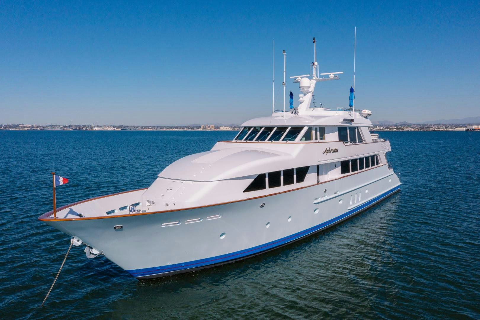 a large white boat in the water aboard APHRODITE Yacht for Sale