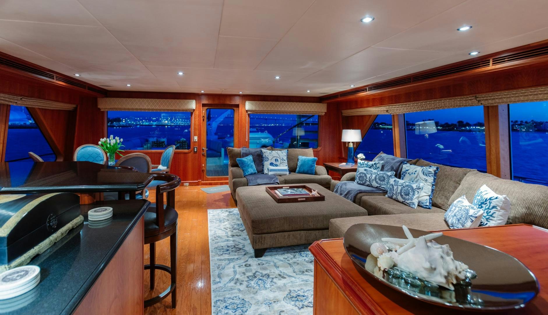 a living room with a large window aboard APHRODITE Yacht for Sale