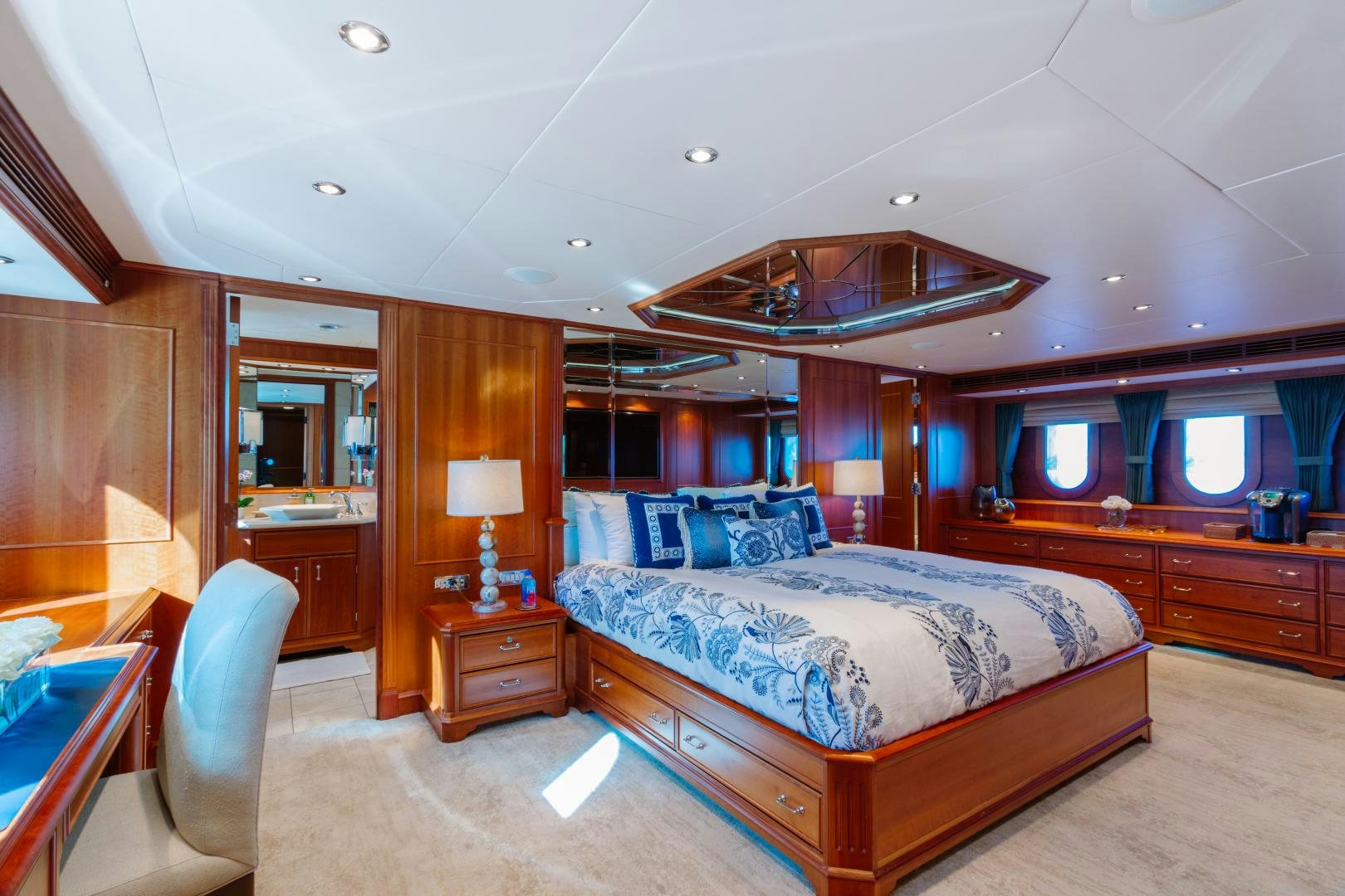 a bedroom with a large bed aboard APHRODITE Yacht for Sale