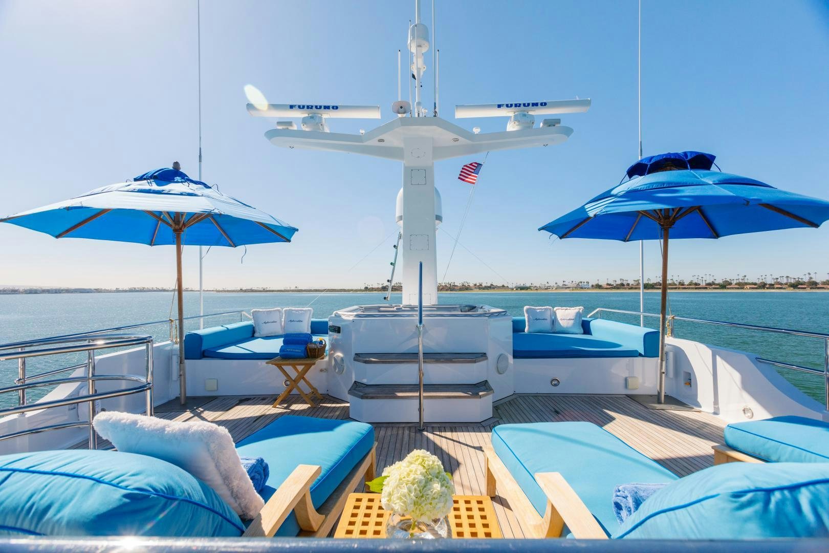 a plane flying over a beach aboard APHRODITE Yacht for Sale