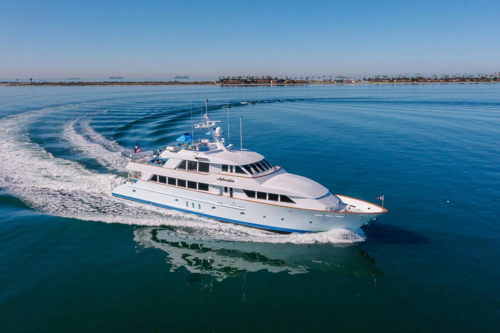 a white boat on water aboard APHRODITE Yacht for Sale