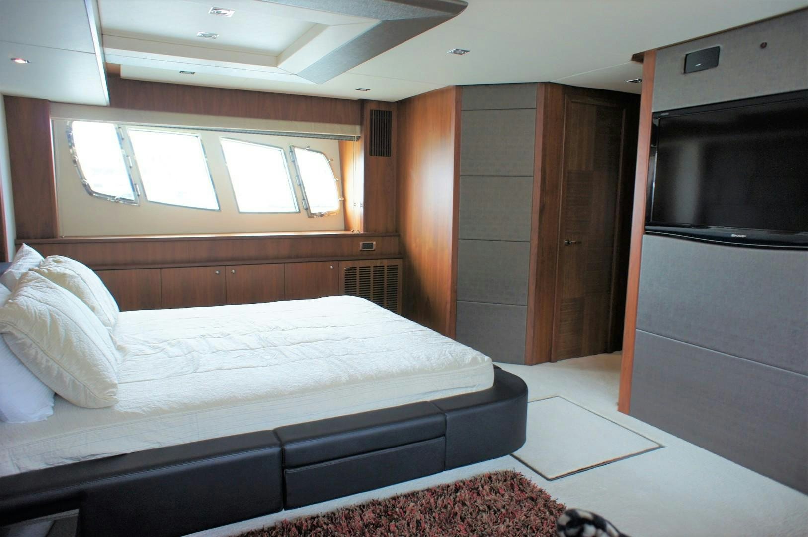a bed in a room aboard SYDNEY Yacht for Sale