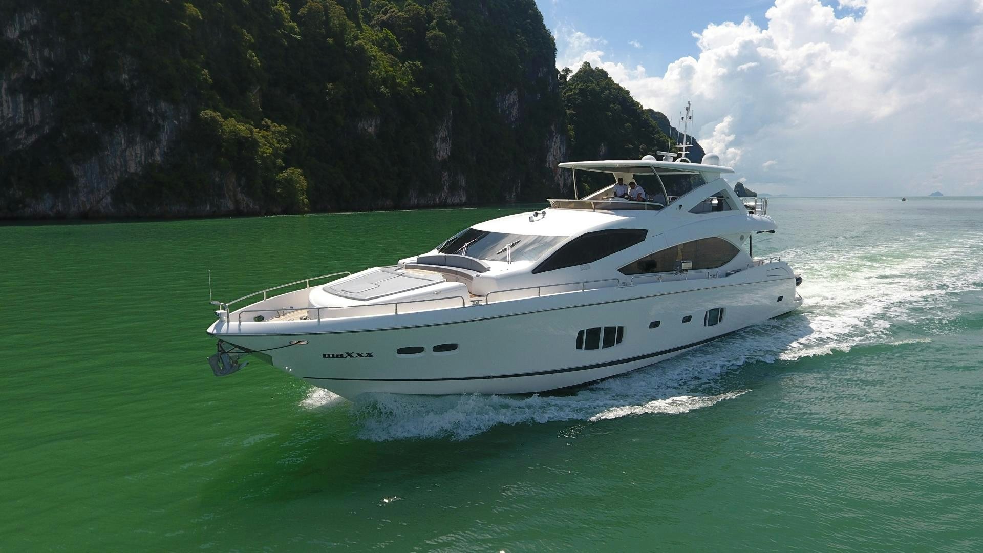 a white yacht on the water aboard SYDNEY Yacht for Sale