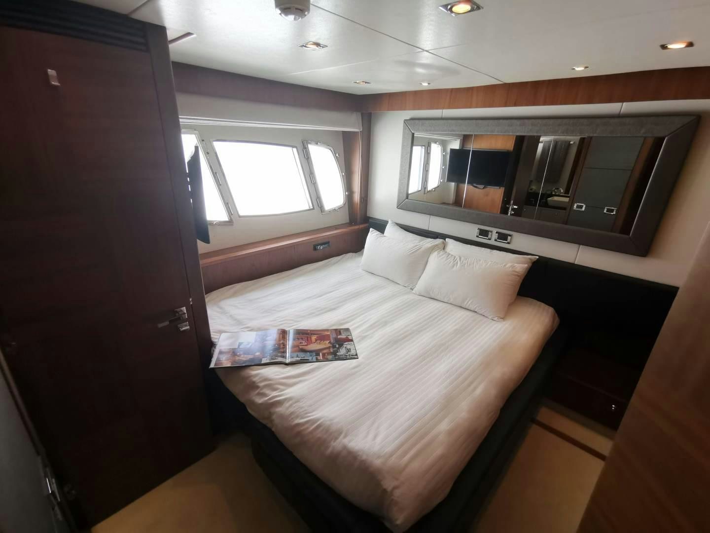 a bed in a room aboard SYDNEY Yacht for Sale
