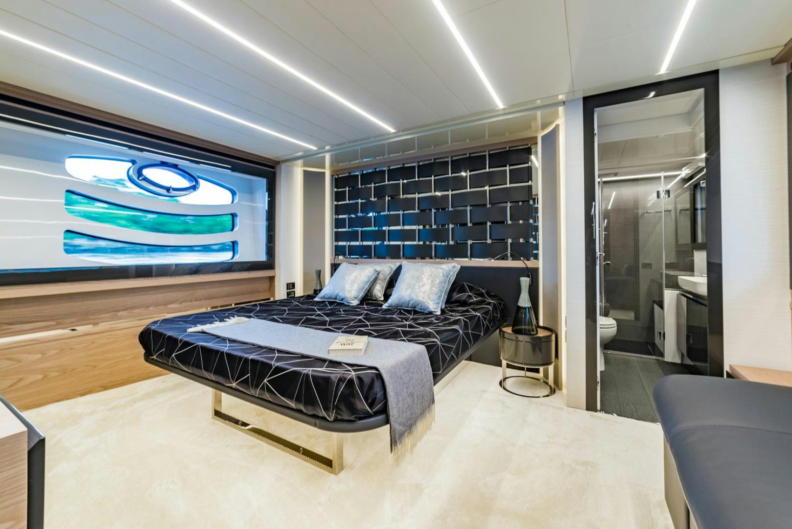 a large bed in a room aboard BAD DADDY Yacht for Sale