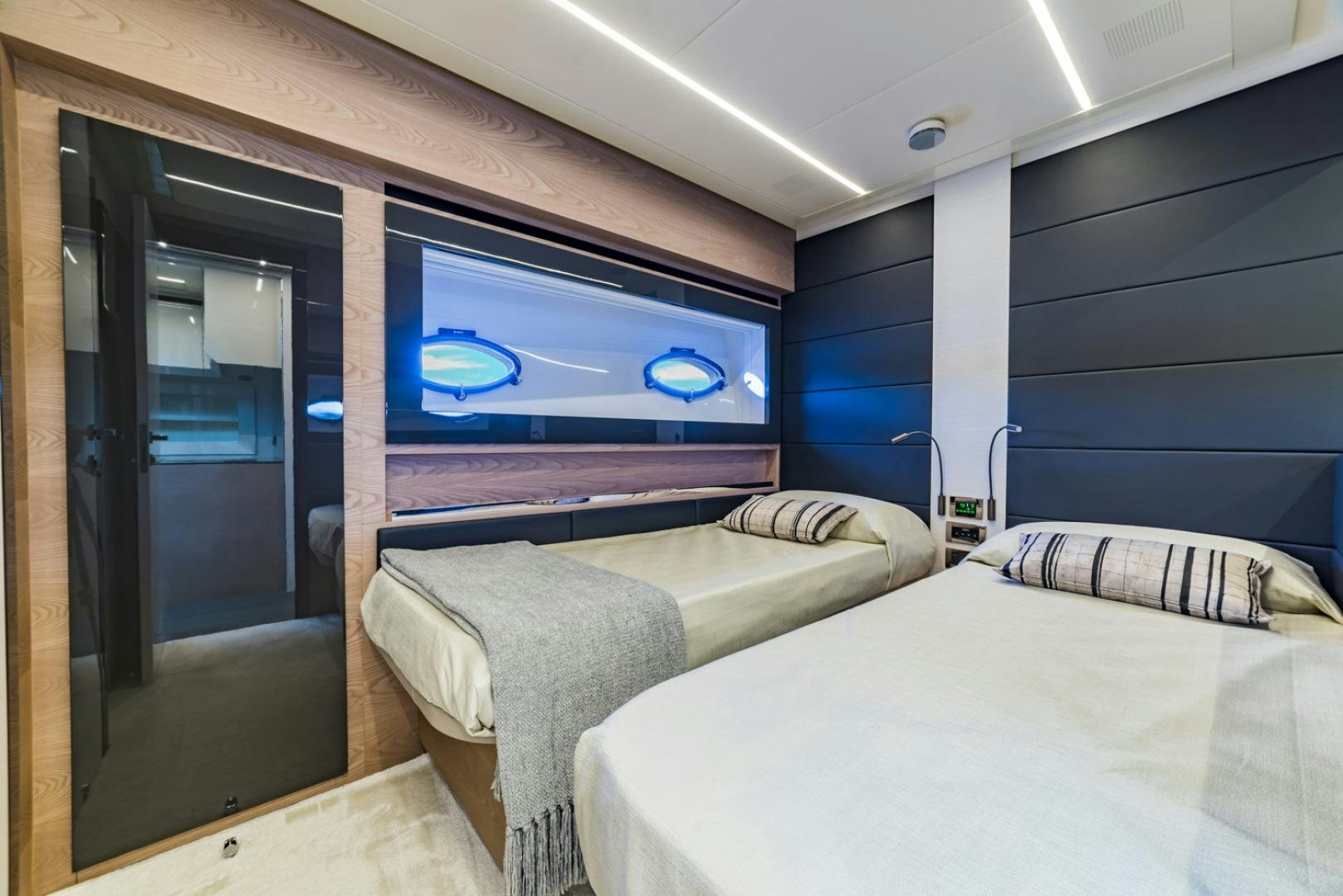 a room with two beds aboard BAD DADDY Yacht for Sale