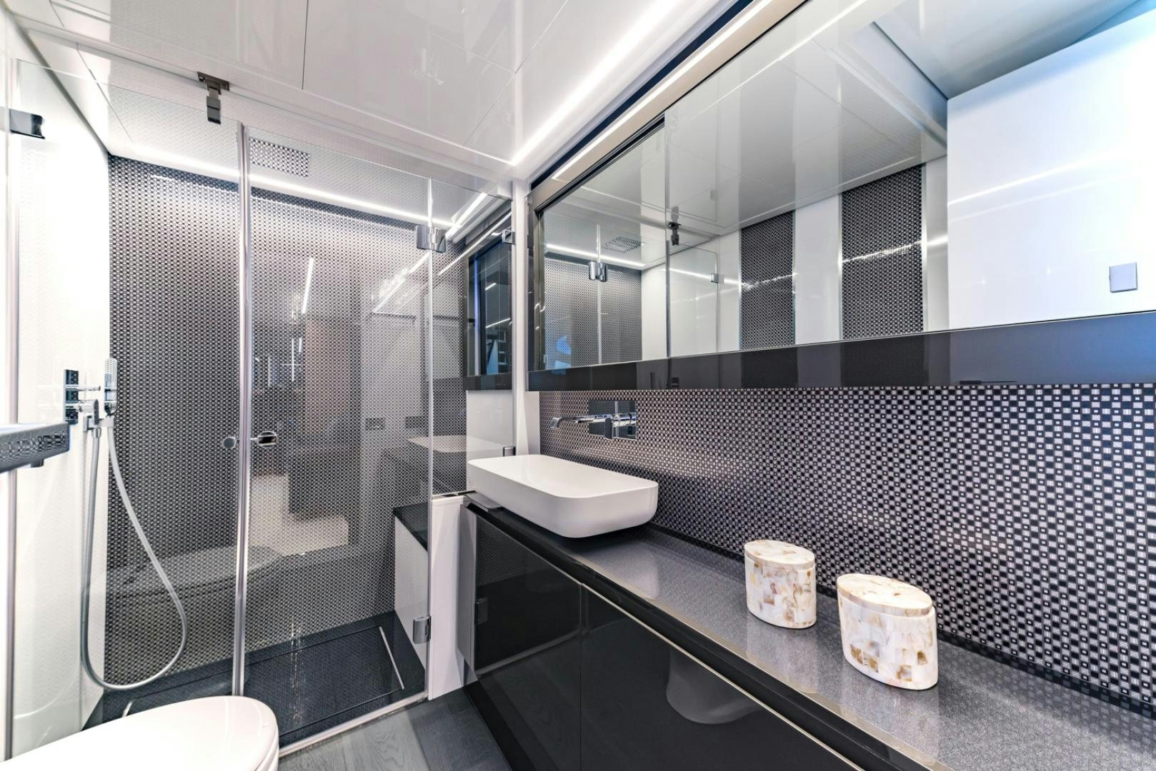a bathroom with a sink and a shower aboard BAD DADDY Yacht for Sale