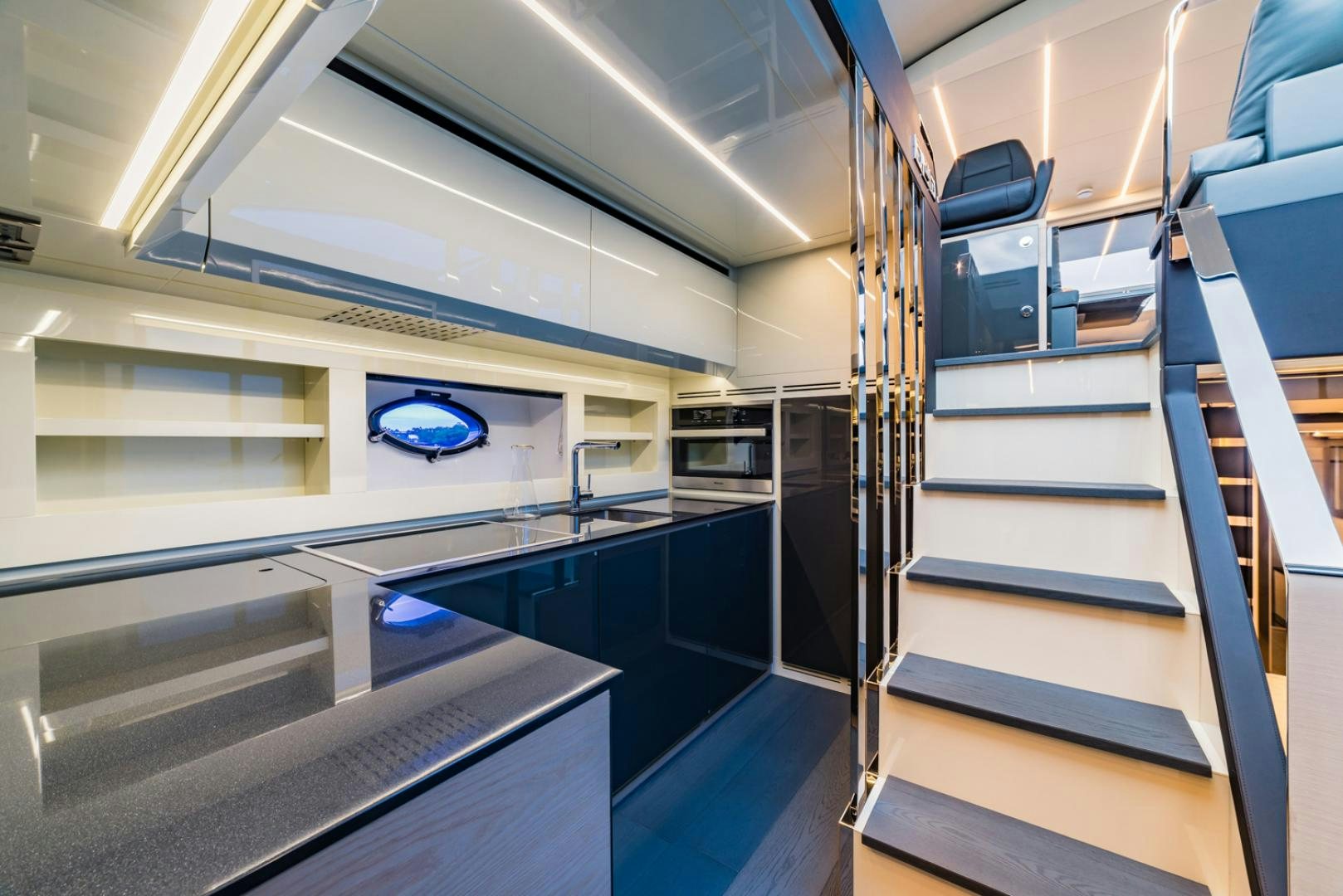 a room with a large shelf and a tv aboard BAD DADDY Yacht for Sale